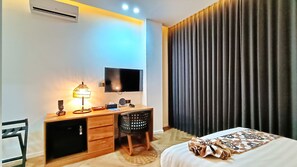 Habitació doble estàndard | Roba de llit d'alta qualitat i caixa forta a l'habitació 