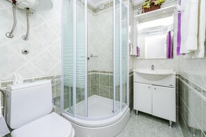 Hair dryer, towels, soap, shampoo