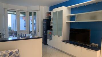 City Apartment, 2 Bedrooms, Balcony, Mountain View | Living area | 32-inch flat-screen TV with cable channels