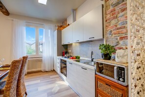 Family House, Multiple Bedrooms (La Valbinella Few Meters From Varese) | Private kitchen | Fridge, microwave, oven, stovetop