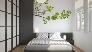 A modern bedroom with a bed, a nightstand, a wall-mounted plant, and a window.