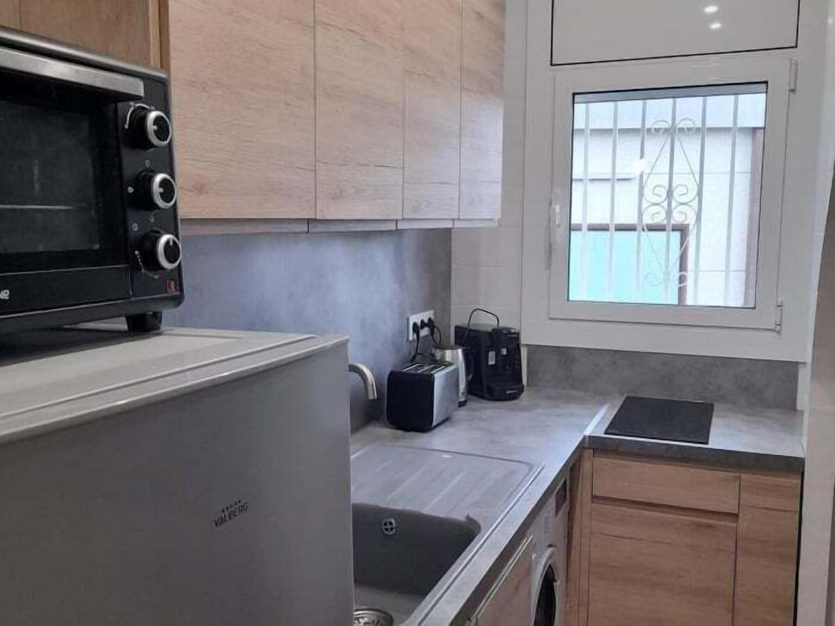 Fridge, microwave, coffee/tea maker, toaster