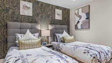 5 bedrooms, desk, iron/ironing board, travel cot