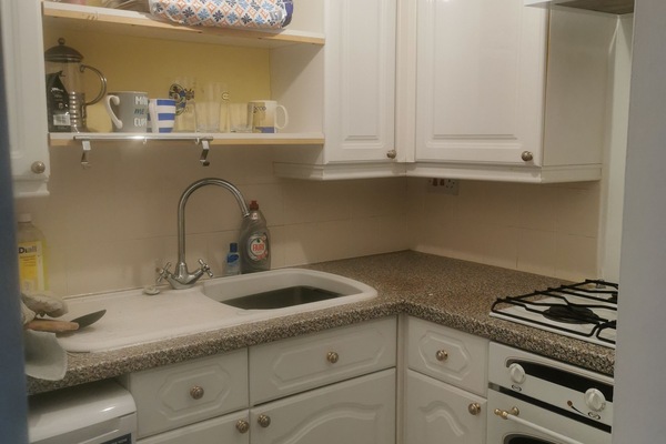 Kitchenette Oven, Toaster, kettle, under counter fridge.