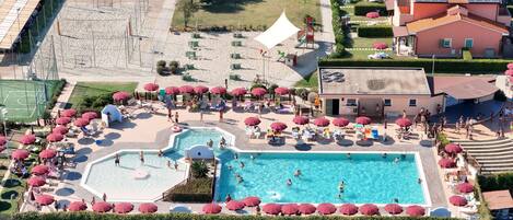 Seasonal outdoor pool, pool umbrellas, pool loungers