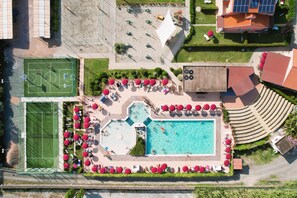 Seasonal outdoor pool, pool umbrellas, pool loungers