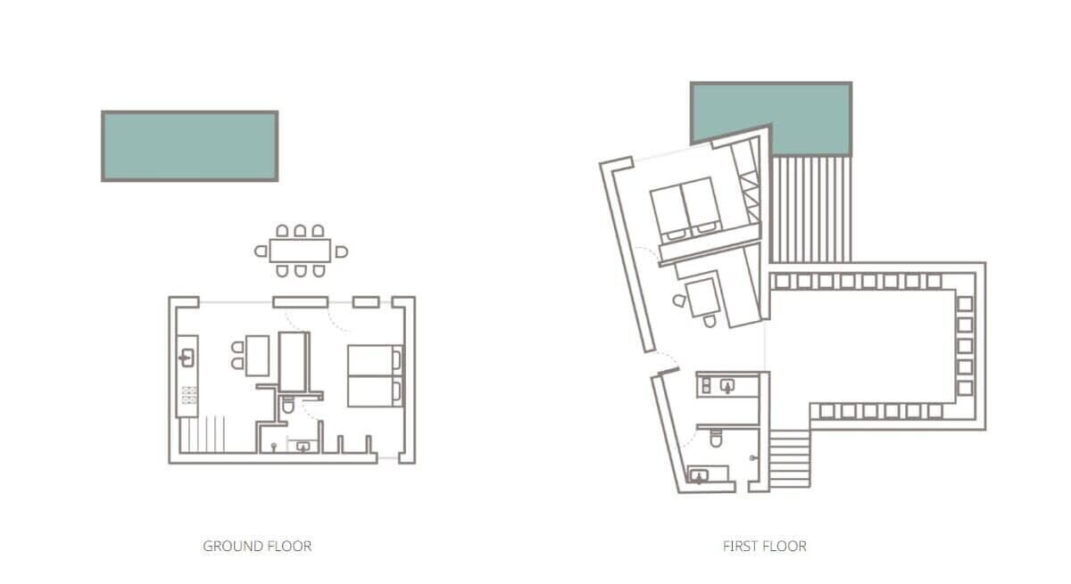 A ground floor layout with a dining area, kitchen, and bathroom, and a first floor layout with a living area, staircase, and additional rooms.