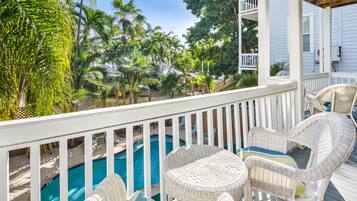 Classic Room, 1 Queen Bed, Balcony, Pool View | 1 bedroom, premium bedding, individually decorated