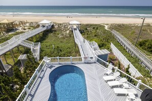 A beachside resort with a swimming pool, beach access, and a gazebo. - A Pierless Vista, Oceanfront House in Atlantic Beach, NC! (Atlantic Beach)