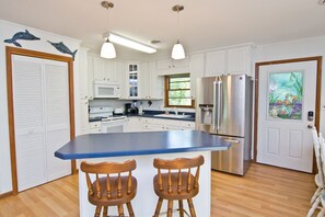 Fridge, microwave, coffee/tea maker, dining tables