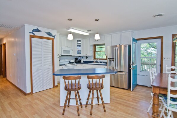 Fridge, microwave, coffee/tea maker, dining tables