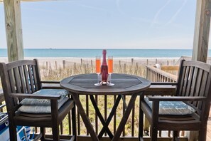 Outdoor dining - At Anchor East, Oceanfront Duplex in Emerald Isle, NC! (Emerald Isle)