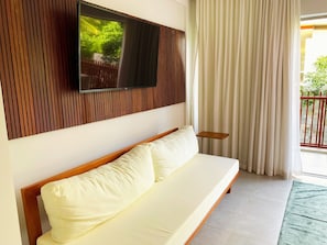 Deluxe Apartment | Living area | TV