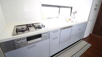 Fridge, microwave, stovetop, cookware/dishes/utensils