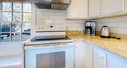 Centrally located charmer with expansive patio, board games, & central AC