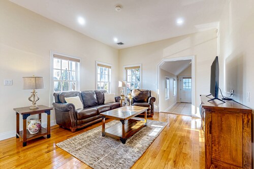 Centrally located charmer with expansive patio, board games, & central AC