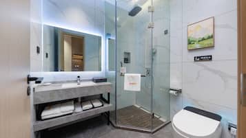 Shower, rainfall showerhead, hair dryer, towels