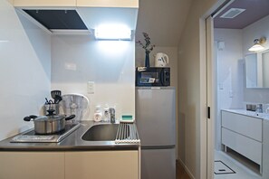 Fridge, microwave, cookware/dishes/utensils