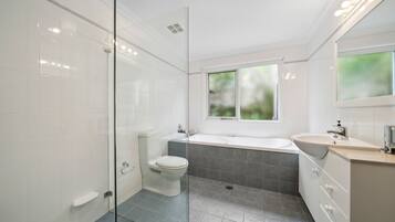 Shower, hair dryer, towels