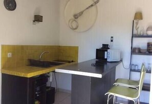 Fridge, microwave, coffee/tea maker, toaster
