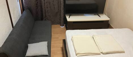 1 slaapkamer, een bureau, gratis wifi, beddengoed