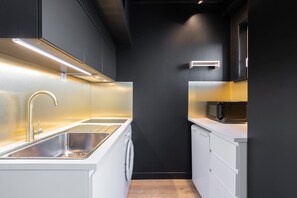 Fridge, microwave, coffee/tea maker, toaster