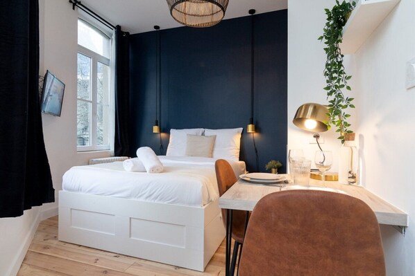 Desk, iron/ironing board, internet, bed sheets