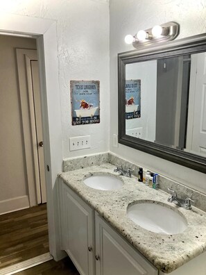 Hair dryer, towels, soap, shampoo