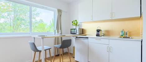 Fridge, microwave, coffee/tea maker, toaster