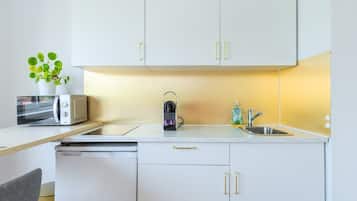 Fridge, microwave, coffee/tea maker, toaster