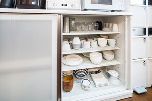 Fridge, microwave, stovetop, cookware/dishes/utensils