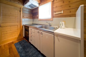 Fridge, microwave, stovetop, cookware/dishes/utensils