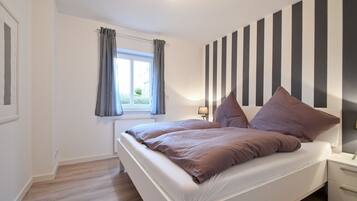 2 bedrooms, iron/ironing board, travel crib, free WiFi