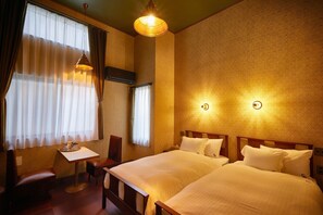 1 室のベッドルーム、デスク、WiFi (無料)、ベッドシーツ