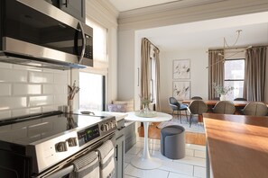 Fridge, microwave, oven, stovetop - The Century House: 5 Bedroom near OSU, Short North Arts District, Convention Ctr (Columbus)