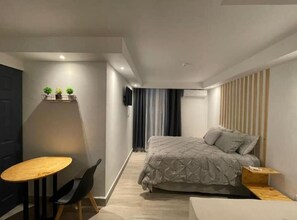 1 habitación, tabla de planchar con plancha, wifi gratis y ropa de cama 