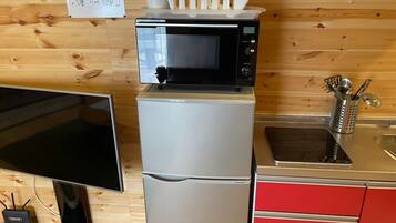 Fridge, microwave, stovetop, cookware/dishes/utensils