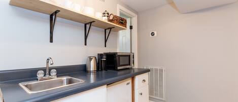 Fridge, microwave, coffee/tea maker, electric kettle