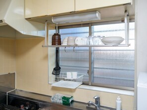 Fridge, microwave, stovetop, cookware/dishes/utensils