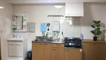 Fridge, microwave, stovetop, cookware/dishes/utensils
