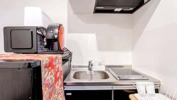 Fridge, microwave, stovetop, cookware/dishes/utensils