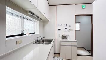 Fridge, microwave, cookware/dishes/utensils