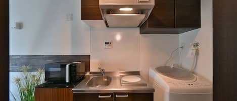 Fridge, microwave, stovetop, cookware/dishes/utensils