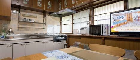 Fridge, microwave, cookware/dishes/utensils