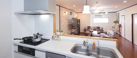Fridge, microwave, stovetop, cookware/dishes/utensils