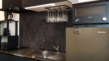 Fridge, microwave, stovetop, cookware/dishes/utensils