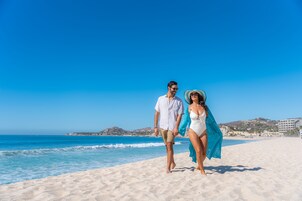 On the beach, white sand, beach towels