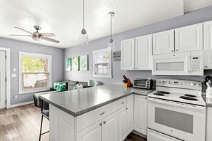 Fridge, oven, dishwasher, coffee/tea maker