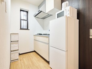 Fridge, microwave, stovetop, cookware/dishes/utensils