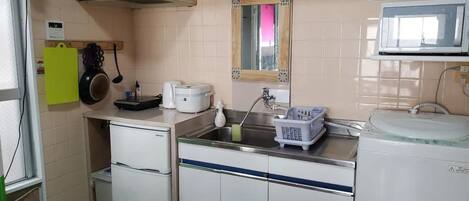 Fridge, microwave, stovetop, cookware/dishes/utensils